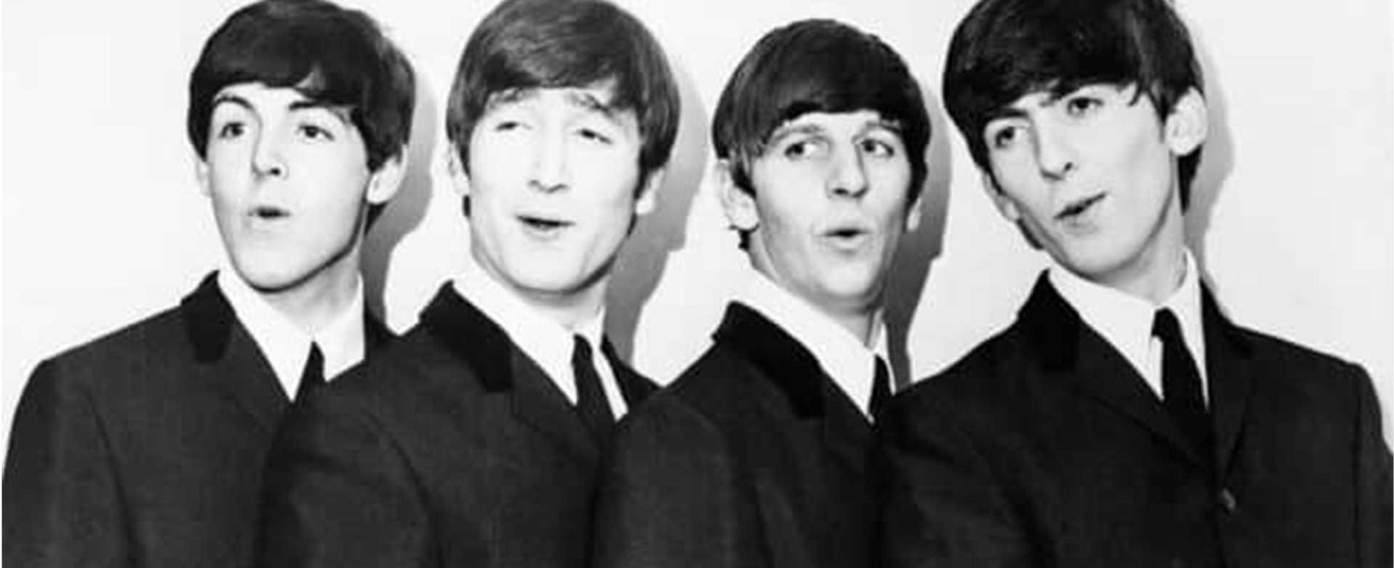 Imagem em preto e branco dos Beatles