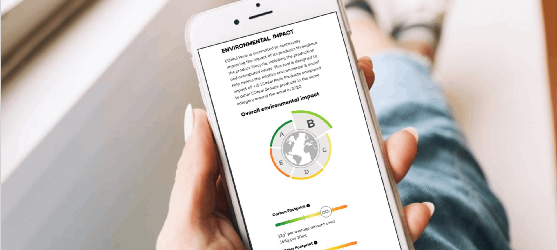 Tela de telefone com informações sobre impacto ambiental